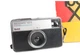 Kodak Film Camera INSTAMATIC 133-X Body- Silver and Black Monochrome photograph