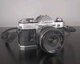 Canon AE-1 35mm SLR Film Camera w/Rokinon 28mm F2.8 Lens - Battery Door Broken