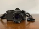 Vintage Pentax MV1 35mm SLR film camera with an SMC Pentax-M 50mm f/2 lens Black