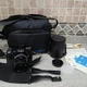 Minolta Maxxum 7000 AF Camera w/28-85mm Lens. Lens Case, Carrying Bag, Paperwork