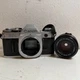 Canon AE-1 Black Silver Focal-Plane Shutter 35mm SLR Film Camera with Lens