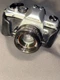 Promaster 2500PK Super Silver SLR Film Camera w/ Promaster MC 50mm Lens Case