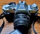 Very good condition Canon AV-1  35mm professional camera W/ OEM Flash and Lens