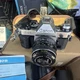 Canon AE-1 Program Black 35mm SLR Film Camera w/ Canon Lens, Case, Manual