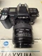 Minolta MAXXUM 7000 AF Camera W/ 2 Sigma Lenses, Flash, Manuals. Tested! See Pic
