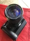 Olympus OM 2S Program Camera With A  Close Focus Zoom Lens And Batteries