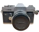 Canon Pellix QL 35mm camera w/FL 50mm f/1.8 lens Excellent Condition--Works