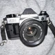 Canon AE-1 Program 35mm SLR Film Camera Black w/ Canon FD 50mm f/1.8