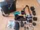 ASSORTED CAMERA LOT WITH BAG CANON AV-1 LENS CONVERTER VIVITAR FLASH THYRISTOR