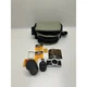 Olympus OM-2N 35mm camera with bag lens and accessories