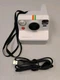 Polaroid Now 9027 I- Type Or 600 Film With Charger.