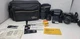 Minolta Maxxum 5000 SLR camera With 3 lenses Flash Carry Bag And Box Of Film.