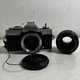 Minolta XG9 Black Silver 35mm SLR Film Camera with MD Rokkor-X 50mm Lens.