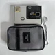 Silver Kodak Disc 4000 Camera  by EASTMAN KODAK COMPANY with strap + Case