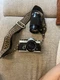 Olympus OM-2n Black 35mm SLR Camera + 50mm f/1.4  Fast Standard Lens With A Spot
