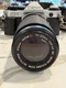 Canon AE-1 Program 35mm SLR Film Camera with 50 mm lens Kit