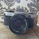Vintage Canon AE-1  35mm SLR film camera with 50mm lens 