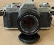 Canon AV-1 35mm Film Camera w/ 2 lenses 50mm & 135mm--Film Tested and works well