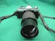MINOLTA XG7 35MM FILM CAMERA + VIVITAR 75MM-205MM LENS + STRAP