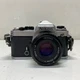 Nikon FE 35mm SLR Camera with Nikon Series E 50mm 1:1.8 Pancake Lens