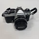 Nikon FE 35mm SLR Film Camera Chrome Kit w/ 50mm f/1.8 AI-S Lens
