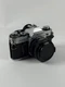 CANON AE-1 chrome SLR 35mm Film Camera with 50mm f1.8 FD KIT