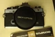 Olympus OM-2n, 50 mm f1.4 lens, 80-200 zoom macro, 135 mm f2.8, flash,    $300