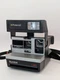VINTAGE POLAROID CAMERA SUN 600 LMS INSTANT FILM WITH STRAP. 