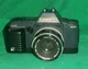 VTG CANON T70 35mm CAMERA DUAL METER SYSTEM FL 50mm LENS 1:1.8 151046 188A FLASH