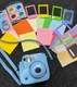 Fujifilm Instax Mini 11 instant camera with assorted accesiories and case