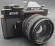 Fuji STX-2 SLR 35mm film camera + 50mm f/1.9 lens FOR PARTS NOT TESTED