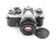 NIKON FE CROME CAMERA BODY WITH NIKON SERIES E 50mm F/1.8 LENS