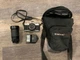 Canon AV-1 35mm SLR Camera With Vivitar 28-210mm Zoom Lens and Carrying Case