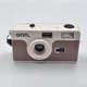 Onn. Focus Free Reusable 35mm Camera with Flash - Beige/Brown