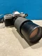 MINOLTA XG7 35MM FILM CAMERA + VIVITAR 75MM-205MM LENS + STRAP