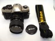 Nikon FM10 35mm Film Camera with 35-70mm & Filter and Cap Very Good -Tested