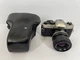 Nikon FM-10 SLR Camera with 35-70mm f/3.5-4.8 Zoom Lens Nice Works