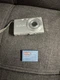 Casio EXILIM EX-Z60 Digital Camera 6 MP Silver. Damage On Battery Door. Pictures