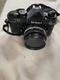 Nikon FE2 35mm SLR Film Camera w/ Nikon Lens Series E 50mm Untested