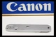 210934 Canon AE-1 Chrome Bottom Cover Repair Part Used Also fits AT-1