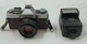 Minolta XG-1 Silver/Black SLR 35MM Camera w/Flash  GC-6610