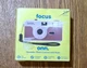 ONN. FOCUS Reusable 35mm Flash Camera Film 27 Exposure Batteries Included Brown