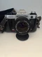 Canon AE-1 Program 35mm Film Camera FD 50mm f/1.8 Lens Manuals Case