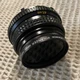 Minolta MD Rokkor-X 45mm 1:2 with Rokinon Polarizer 49mm filter
