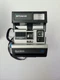 Polaroid Sun 600 SE Instant Camera w/ Strap