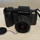 PENTAX SF7 Black AF 35mm SLR Film Camera Body with Attached Lens