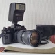Canon A-1 Black 35mm Film Camera with New FD 35-105mm Lens and Speedlite 188A