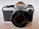 Nikon FM 35mm SLR Film Camera with 50 mm lens Kit - Good Condition. Works Great!