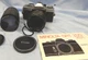 Minolta XG-1 (n) SLR film camera  with  telephoto  lenses and accessories. 