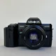 Minolta 7000 Maxxum 35mm SLR Camera Black with AF 50mm f/1.7 Lens , Flash & case